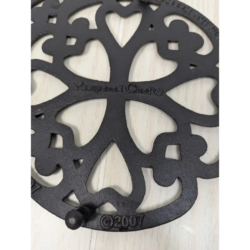Pampered Chef 2007 copper metal trivet hearts scrolls